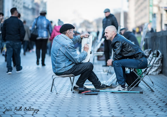 Behoteguy Photo Art  Street artist drawing a portrait in Kiev main square