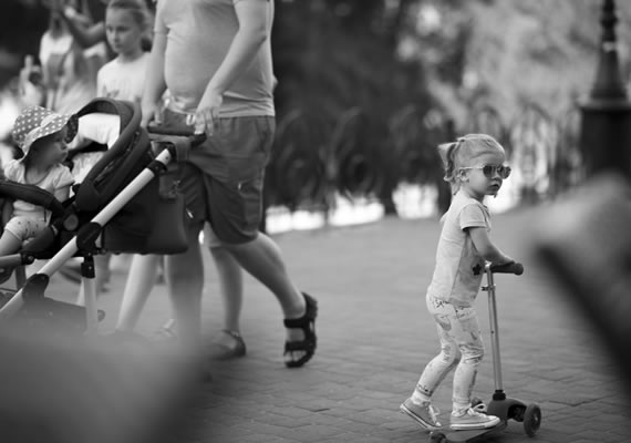 Urban photos in Kiev Ukraine little girls with heart glasses